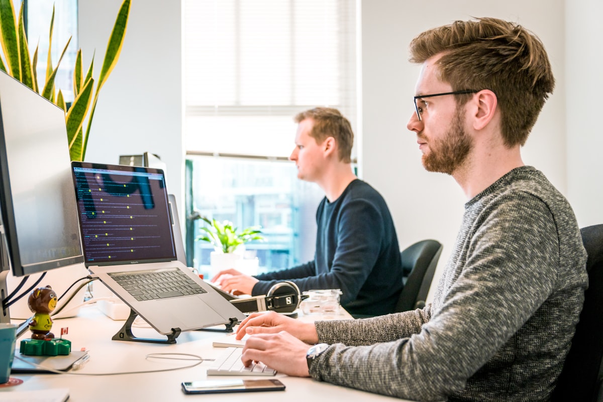 Engineers working on integration code